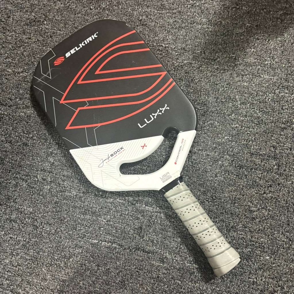 Selkirk Pickleball Paddle with Red and Black Design